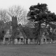 1998 black and white image of a run down Lodge building at the Packard Proving Grounds Historic Site