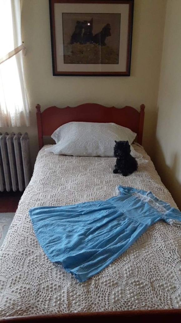 Roberta's room at the Packard Proving Grounds Lodge House with a popcorn-crocheted blanket